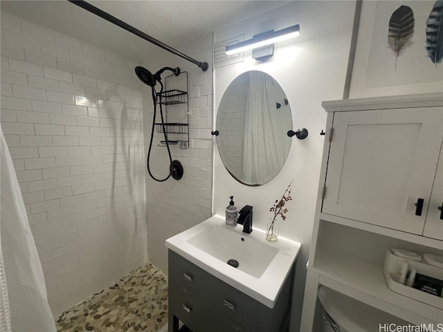 bathroom with vanity, toilet, and walk in shower