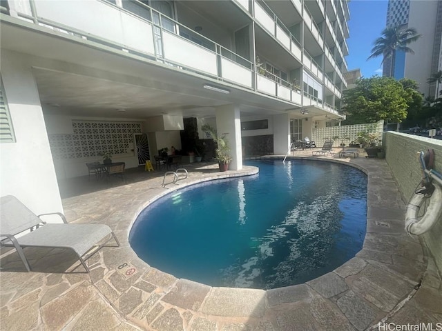 view of pool with a patio