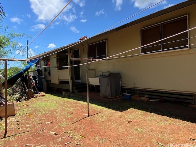 rear view of house featuring a patio