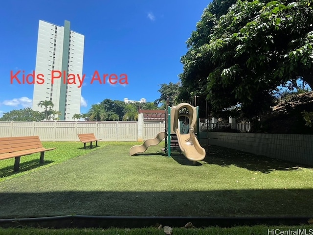 view of playground featuring a lawn