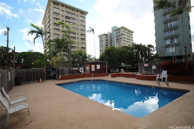 view of pool featuring a patio area