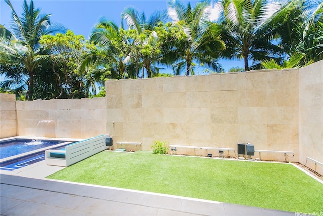 1118 Ala Moana Blvd Unit 2, Honolulu, HI 96814 - view of yard featuring fence and a jacuzzi
