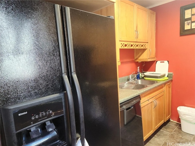 kitchen featuring dishwasher, light brown cabinets, fridge, sink, and light tile patterned floors