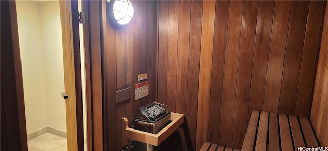 view of sauna / steam room featuring wooden walls