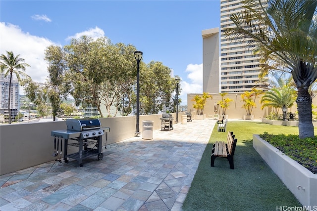 view of property's community with a patio area