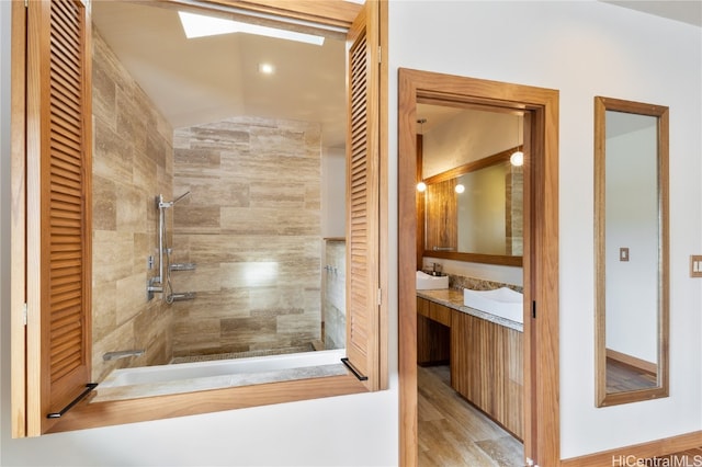 bathroom featuring vanity and hardwood / wood-style floors