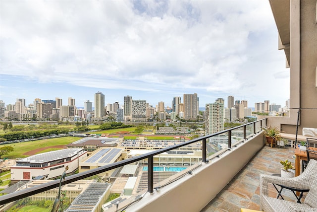 581 Kamoku St Unit 2402, Honolulu, HI 96826 - balcony featuring a view of skyline