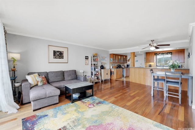 581 Kamoku St Unit 2402, Honolulu, HI 96826 - living area with light wood-type flooring, a ceiling fan, and ornamental molding