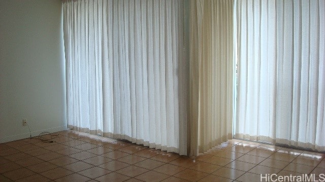 view of tiled empty room