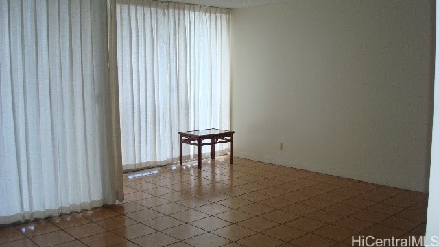 view of tiled spare room