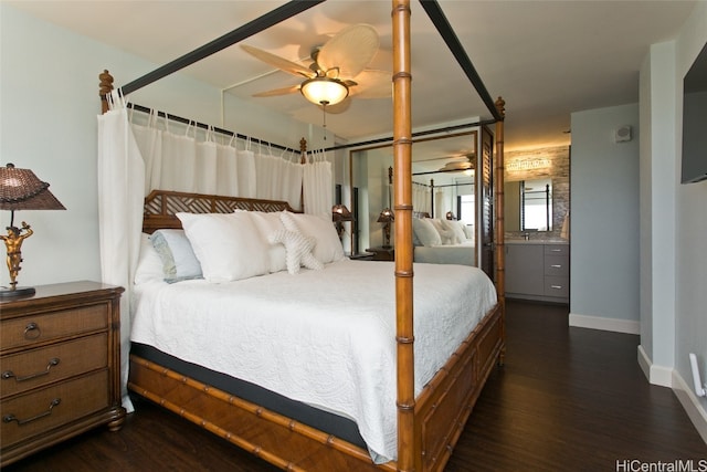 bedroom with dark hardwood / wood-style floors and ceiling fan