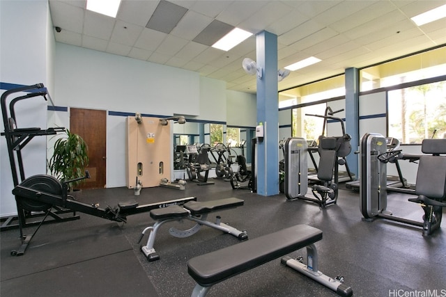 exercise room with a drop ceiling