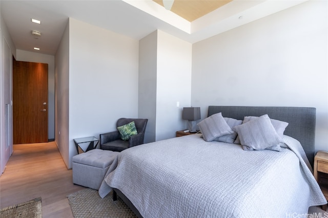 bedroom with light hardwood / wood-style flooring