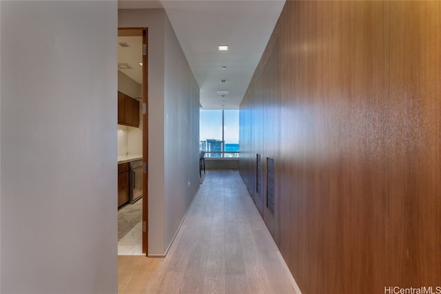 corridor featuring light hardwood / wood-style flooring