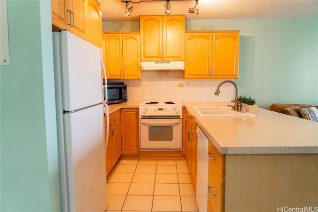 kitchen with backsplash, sink, light tile patterned flooring, a textured ceiling, and white appliances