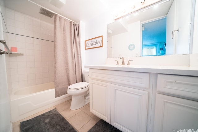 full bathroom with vanity, shower / tub combo, toilet, and tile patterned floors