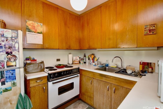 1511 Nuuanu Ave Unit 338, Honolulu, HI 96817 - kitchen featuring white appliances, light countertops, a sink, and brown cabinetry