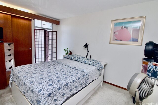 1511 Nuuanu Ave Unit 338, Honolulu, HI 96817 - bedroom with light colored carpet and baseboards
