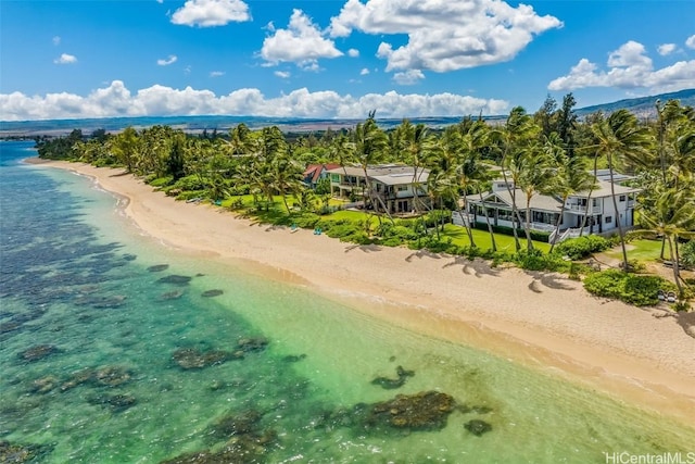 drone / aerial view with a view of the beach and a water view