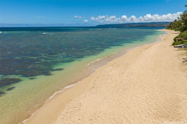 property view of water featuring a beach view