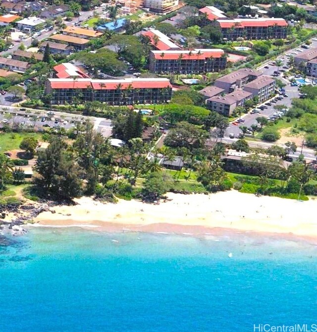 aerial view with a view of the beach and a water view