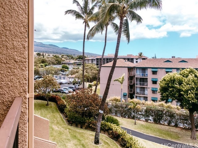 view of building exterior with a mountain view