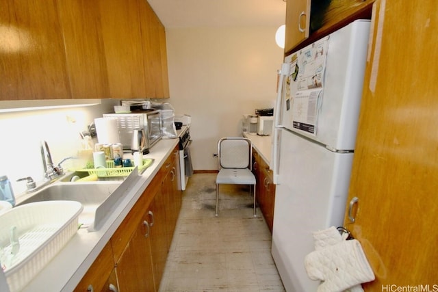 kitchen featuring white fridge