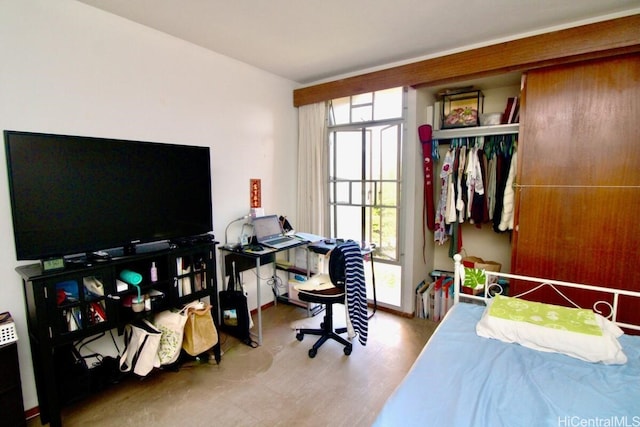 bedroom featuring hardwood / wood-style flooring