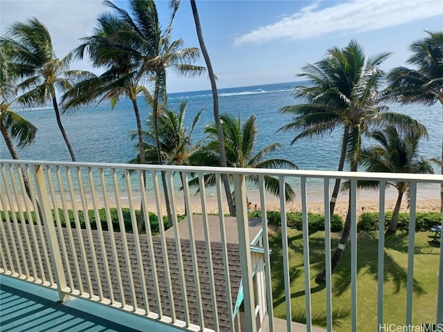 exterior space featuring a view of the beach and a water view