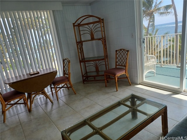 interior space with a healthy amount of sunlight and light tile patterned floors