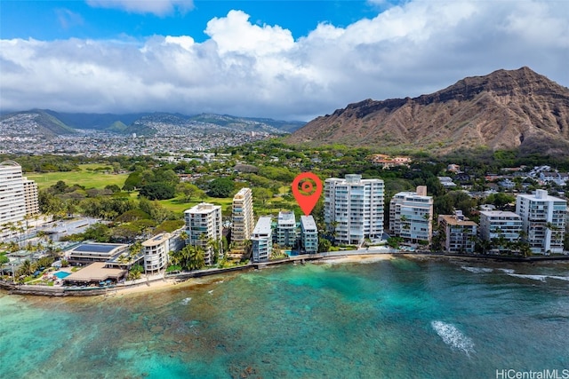 bird's eye view with a water and mountain view