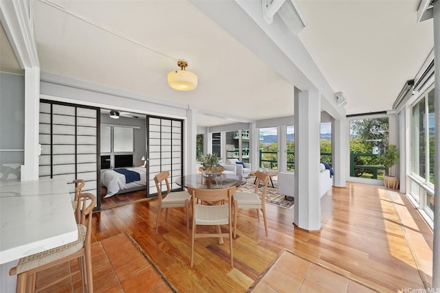 sunroom featuring wood finished floors