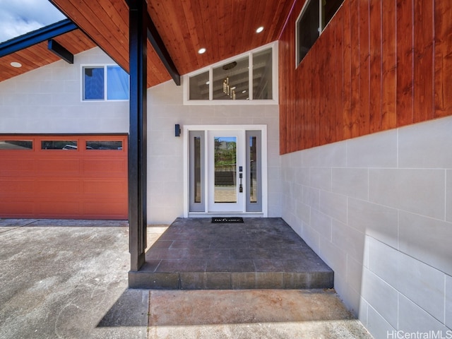 entrance to property featuring a garage