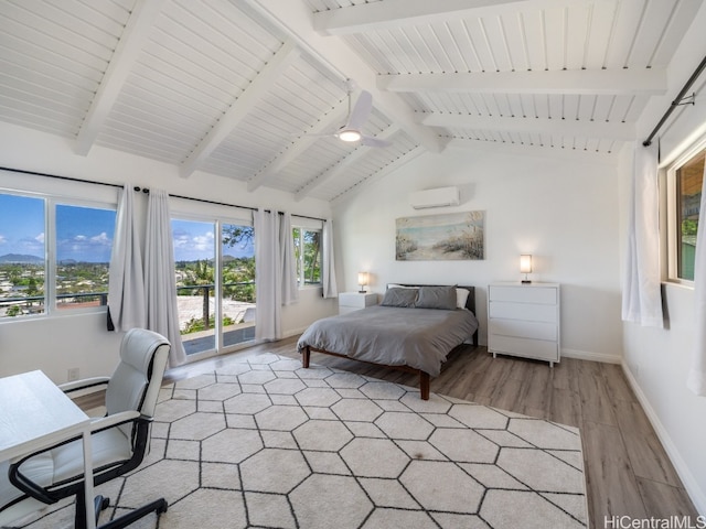 bedroom featuring a wall mounted air conditioner, vaulted ceiling with beams, access to exterior, and light wood-type flooring