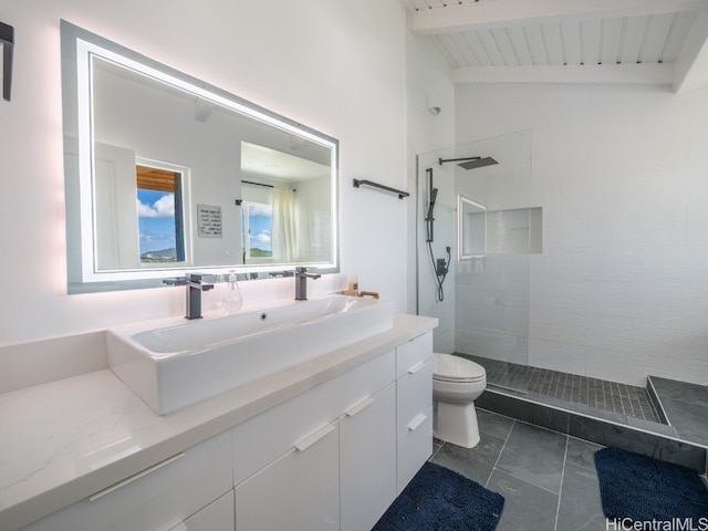 bathroom featuring vaulted ceiling with beams, wood ceiling, toilet, vanity, and a tile shower