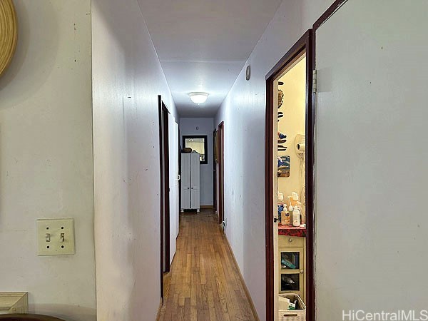 hallway featuring light hardwood / wood-style floors