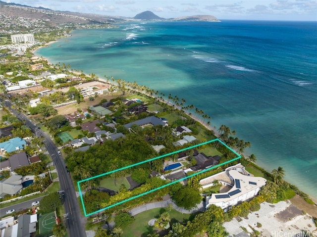 aerial view featuring a water and mountain view