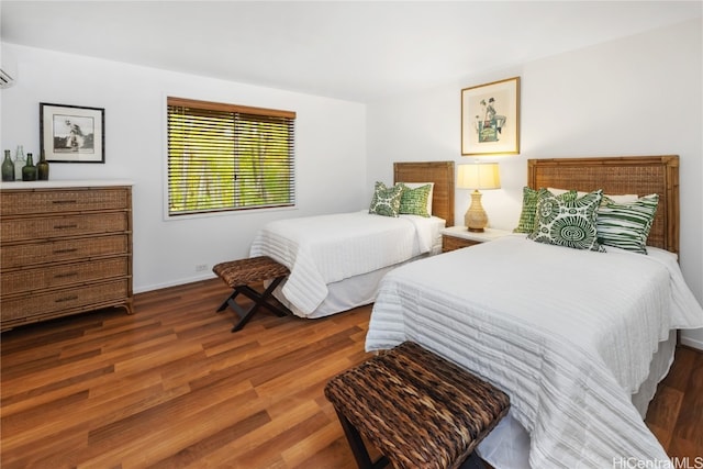 bedroom featuring dark hardwood / wood-style floors