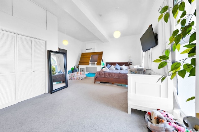 carpeted bedroom with a closet