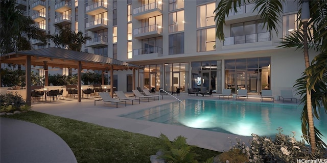 pool featuring a gazebo and a patio