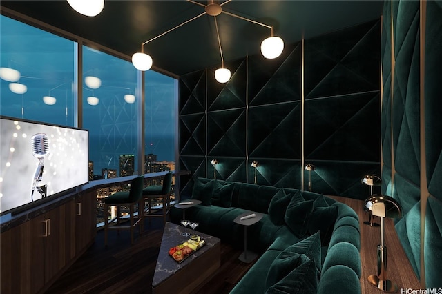 home theater featuring dark wood finished floors