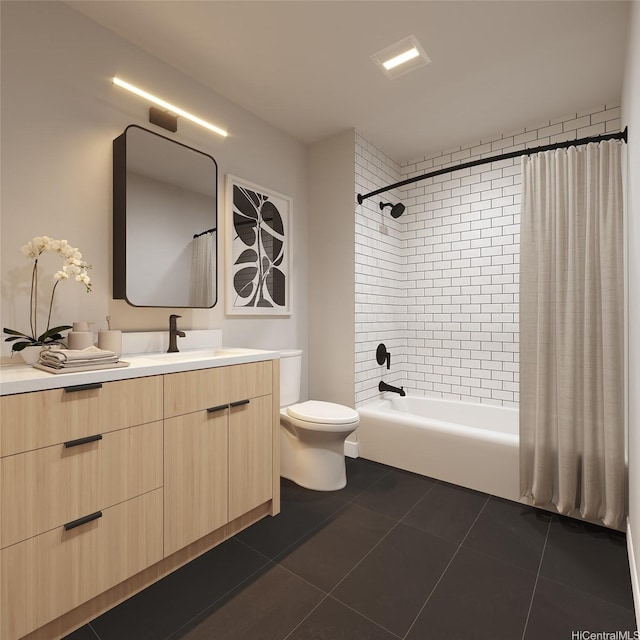 bathroom featuring tile patterned floors, shower / bath combo, vanity, and toilet