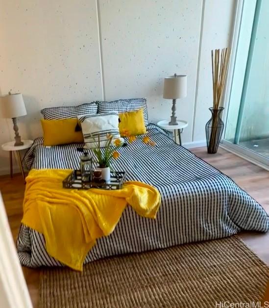 bedroom featuring hardwood / wood-style floors