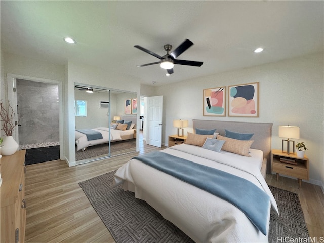 bedroom featuring a closet, light wood-type flooring, and ceiling fan