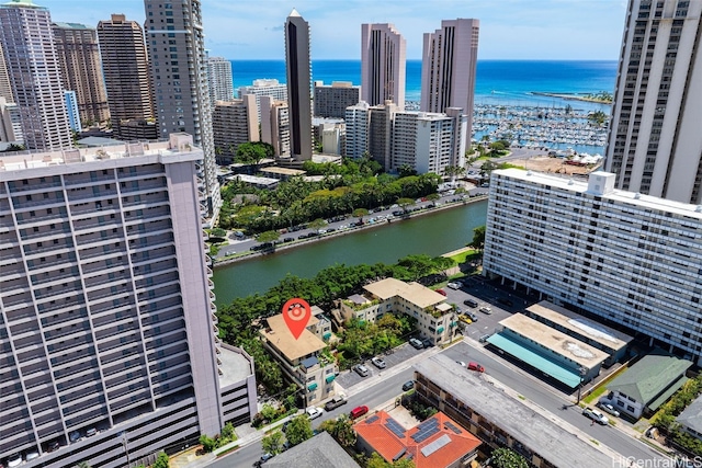 birds eye view of property featuring a water view