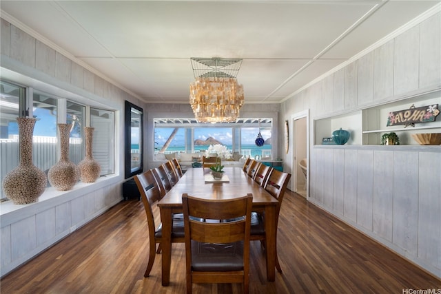 1276 Mokulua Dr, Kailua, HI 96734 - dining area with dark wood-style flooring, ornamental molding, a chandelier, and wood walls