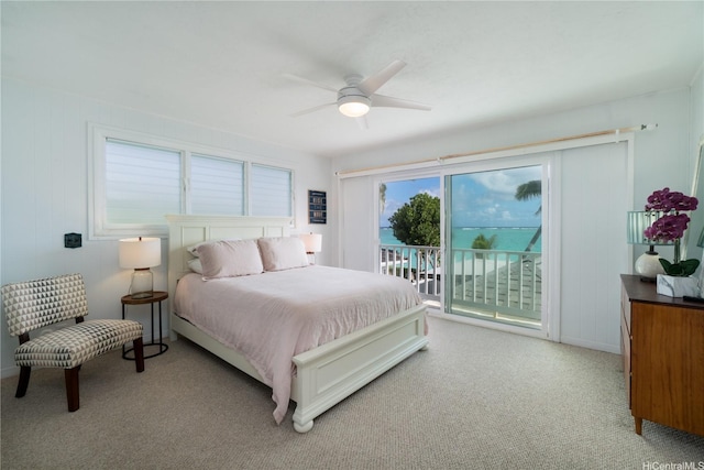 1276 Mokulua Dr, Kailua, HI 96734 - bedroom featuring access to outside, light carpet, a ceiling fan, and baseboards