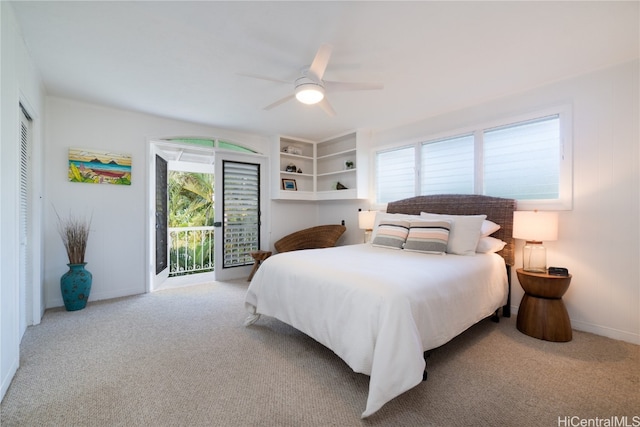 bedroom with a closet, ceiling fan, light colored carpet, and access to exterior