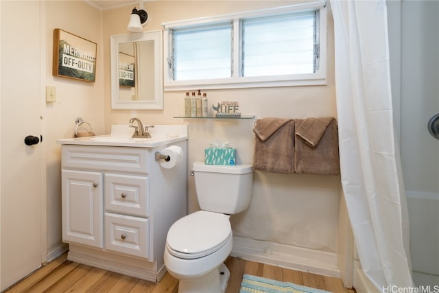 bathroom with vanity, a shower with curtain, wood-type flooring, and toilet