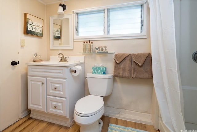 1276 Mokulua Dr, Kailua, HI 96734 - full bath featuring vanity, wood finished floors, toilet, and plenty of natural light